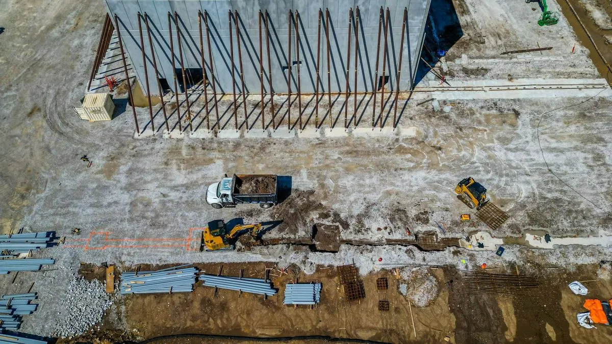 Aerial view of tilt-wall concrete panels being erected